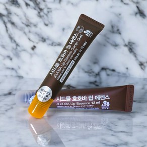 [초고보습]+시드물 호호바 립 에센스 2가지 향 중 택 1 JOJOBA Lip Essence 촉촉입술 립케어 립각질진정 쫀쫀제형 입술 볼륨감, 1개, 고보습(오렌지향), 13ml