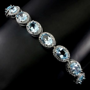 7x5mm 오벌 Sky Blue Topaz Cz 925 은팔찌 9인치(22.9cm) 1919