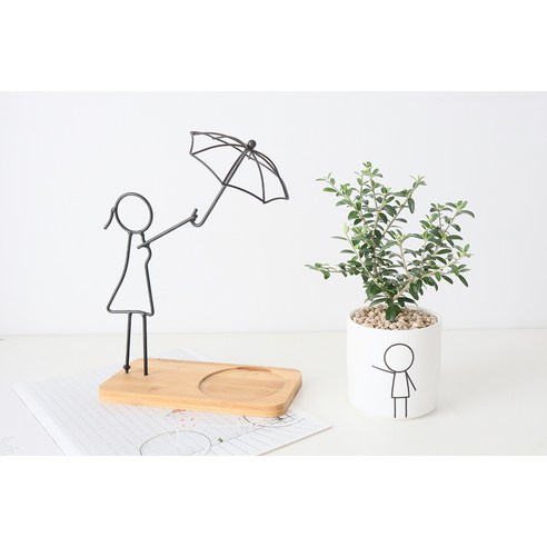 삭막한 일상에 싱그러움을 더하다: 올리브 나무 한 그루가 가져다 준 작은 변화