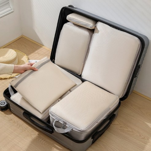 여행을 위한 필수품: 부피순삭 캠핑 압축 파우치 4종 세트