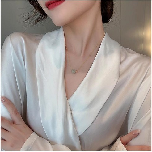 긍정적 에너지를 전달하는 재물운과 소원성취 상징 옥 목걸이