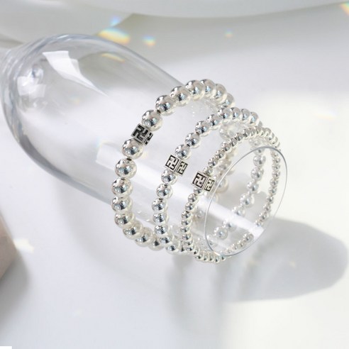 은의 품질과 만자 심볼의 영성이 조화된 만자 은볼 염주 팔찌