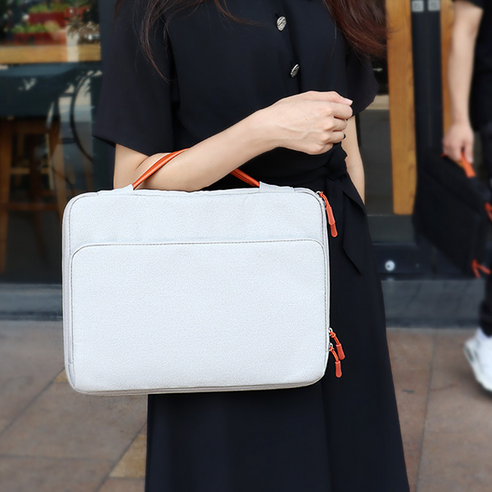 노트북을 안전하게 보호하고 스타일리시하게 휴대하는 데 이상적인 태스코나 퍼펙실드 노트북 파우치