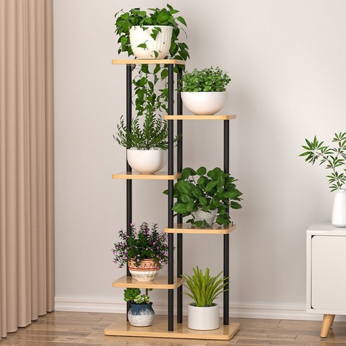 초록을 담은 공간의 미학, CK리빙 거실 화분 정리대