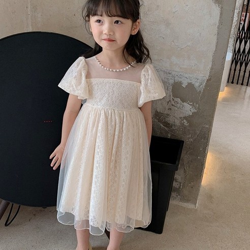 Elevate Your Little One's Style with the Enchanting Junior Performance Dress