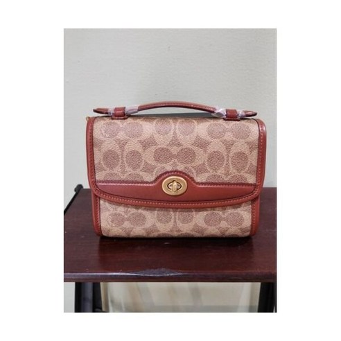 코치 킵 시그니처 캔버스 크로스바디 백 탠 러스트 여성 가방