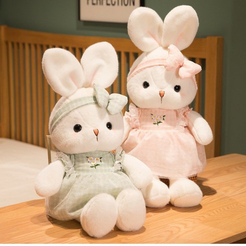 사랑스러움과 포근함으로 일상에 행복을 더하는 큐티빈 리본 토끼 애착인형