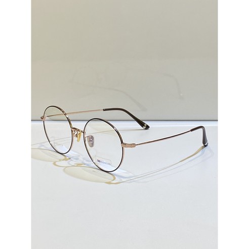 섬세한 아름다움이 깃든 백산안경 KM-5029 컬러 33, 당신의 눈빛에 특별함을 더하다